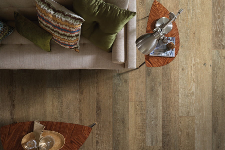 Vinyl waterproof floor installed in sleek, elegant, and modern living room.