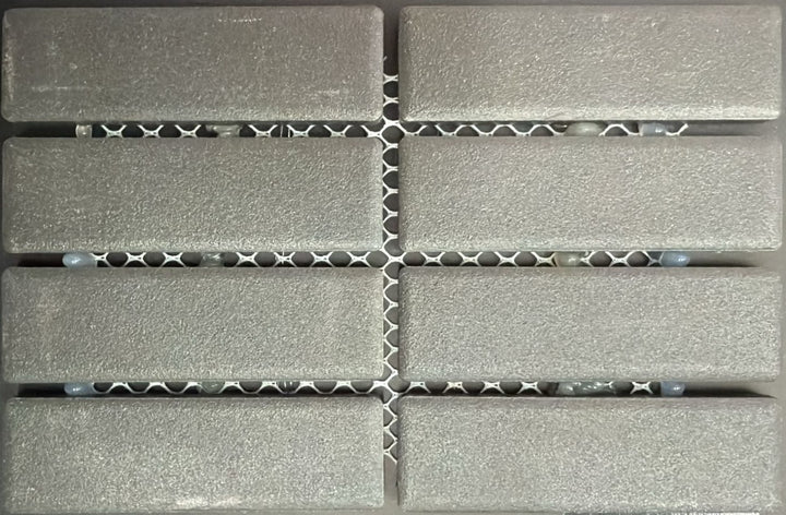 1867 Tile TYPE Collection: mosaic tiles for floor and wall in anthracite, 1"x3" size. Available at Advanced Flooring Waterloo. 