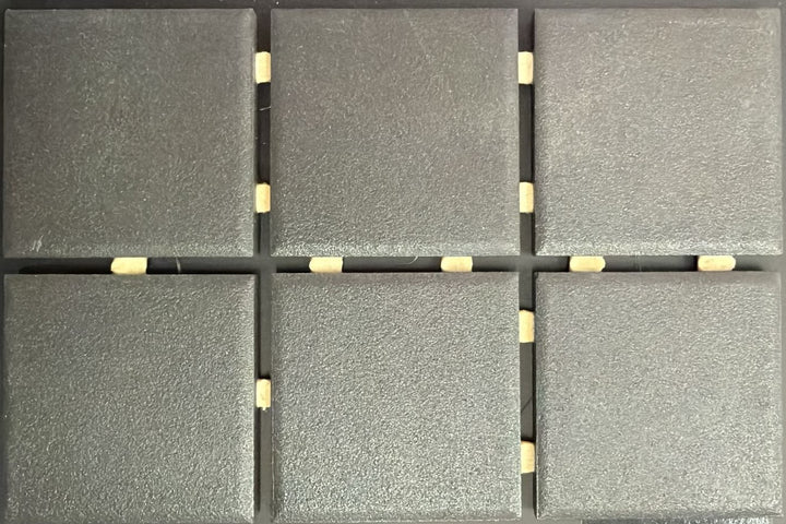 1867 Tile TYPE Collection: mosaic tiles for floor and wall in anthracite, 2"x2" size. Available at Advanced Flooring Waterloo. 