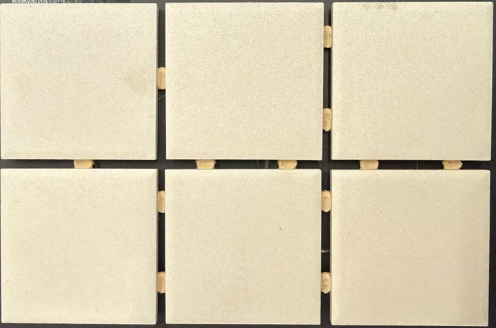 1867 Tile TYPE Collection: mosaic tiles for floor and wall in Bone, 2"x2" size. Available at Advanced Flooring Waterloo. 