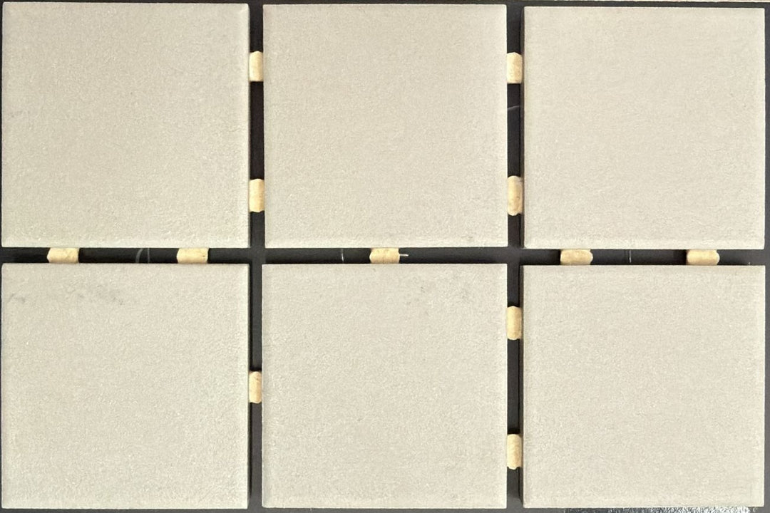 1867 Tile TYPE Collection: mosaic tiles for floor and wall in grey, 2"x2" size. Available at Advanced Flooring Waterloo. 