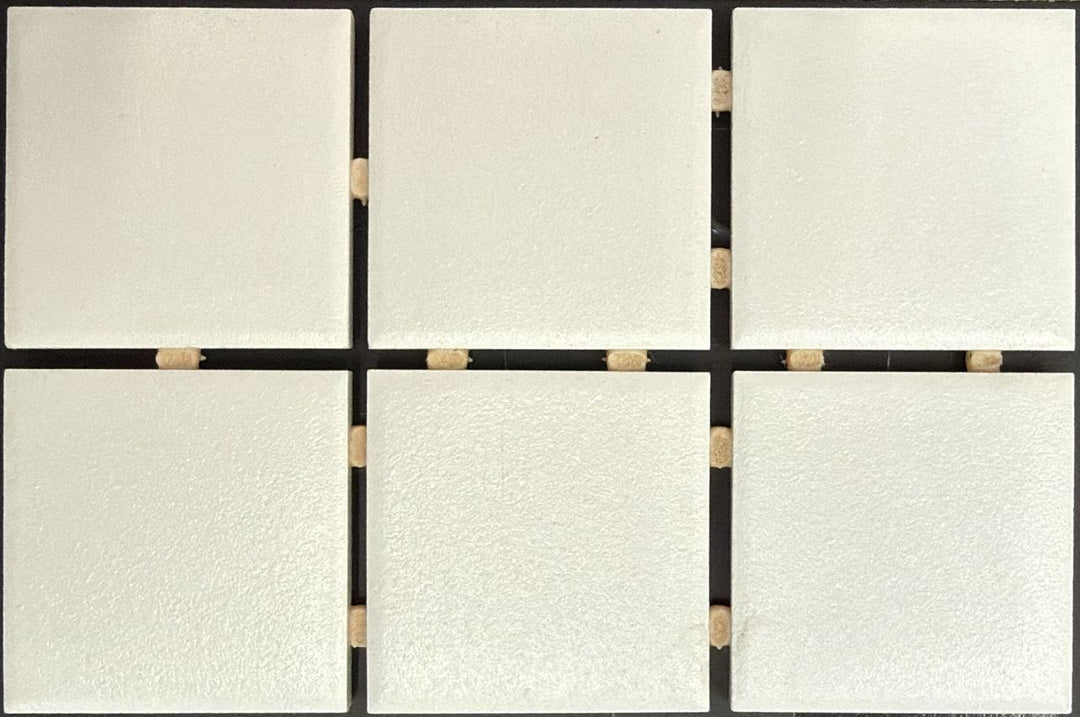 1867 Tile TYPE Collection: mosaic tiles for floor and wall in white, 2"x2" size. Available at Advanced Flooring Waterloo. 