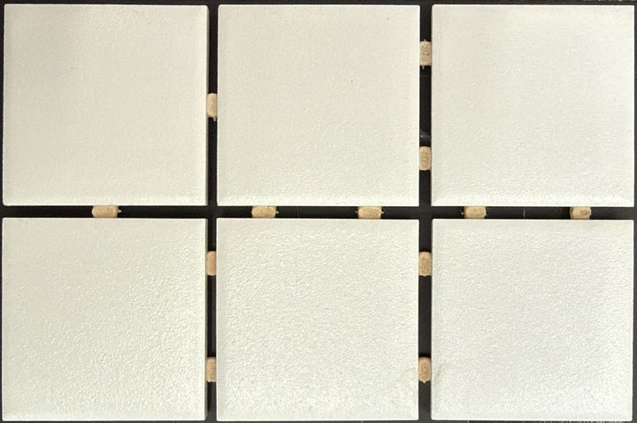 1867 Tile TYPE Collection: mosaic tiles for floor and wall in white, 2"x2" size. Available at Advanced Flooring Waterloo. 