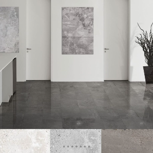 Interior setting showing porcelain tiles in gray, white, and black colors installed on the floor, with a door and decorative wall art in the background.