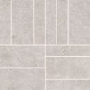 Gray tile with subtle texture on a matching gray background