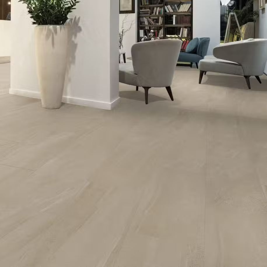 Beige tiled floor with a modern living room in the background