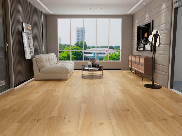 Modern living room with beige sofa, coffee table, and TV against a large window.