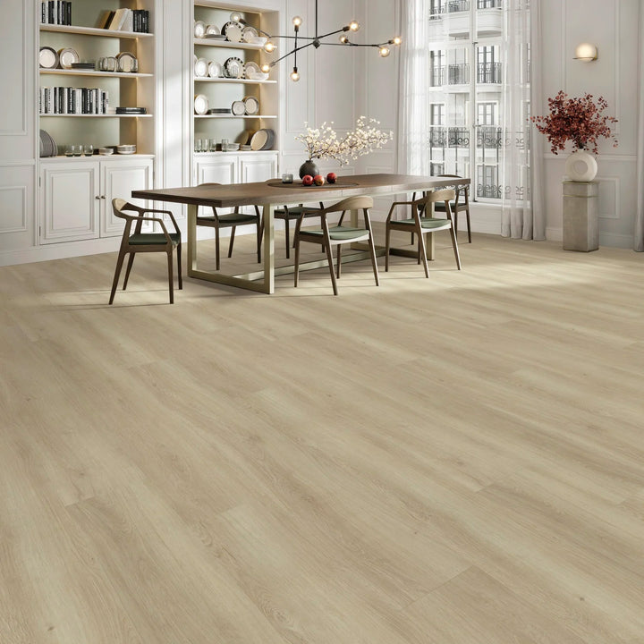 Dining room with wooden floor, table, and chairs.