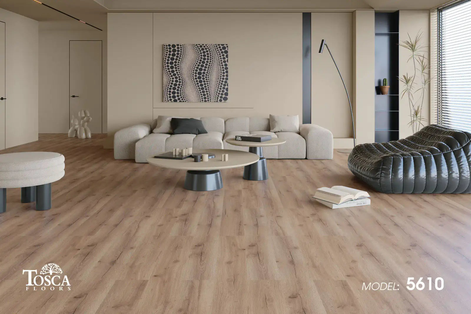 Modern living room with wooden flooring, furniture, and a Tosca Floors logo.