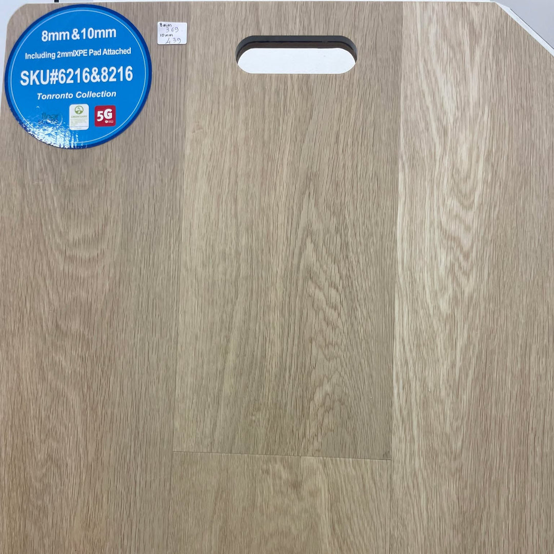 Close-up showing the texture and color of Toronto - Riche 8mm & 10mm vinyl flooring.