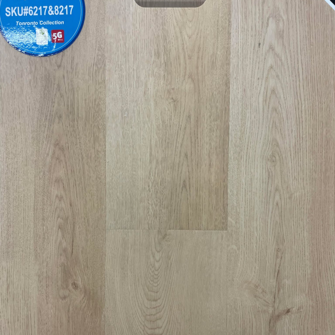 Close-up showing the texture and color of Riche 8mm & 10mm vinyl flooring.