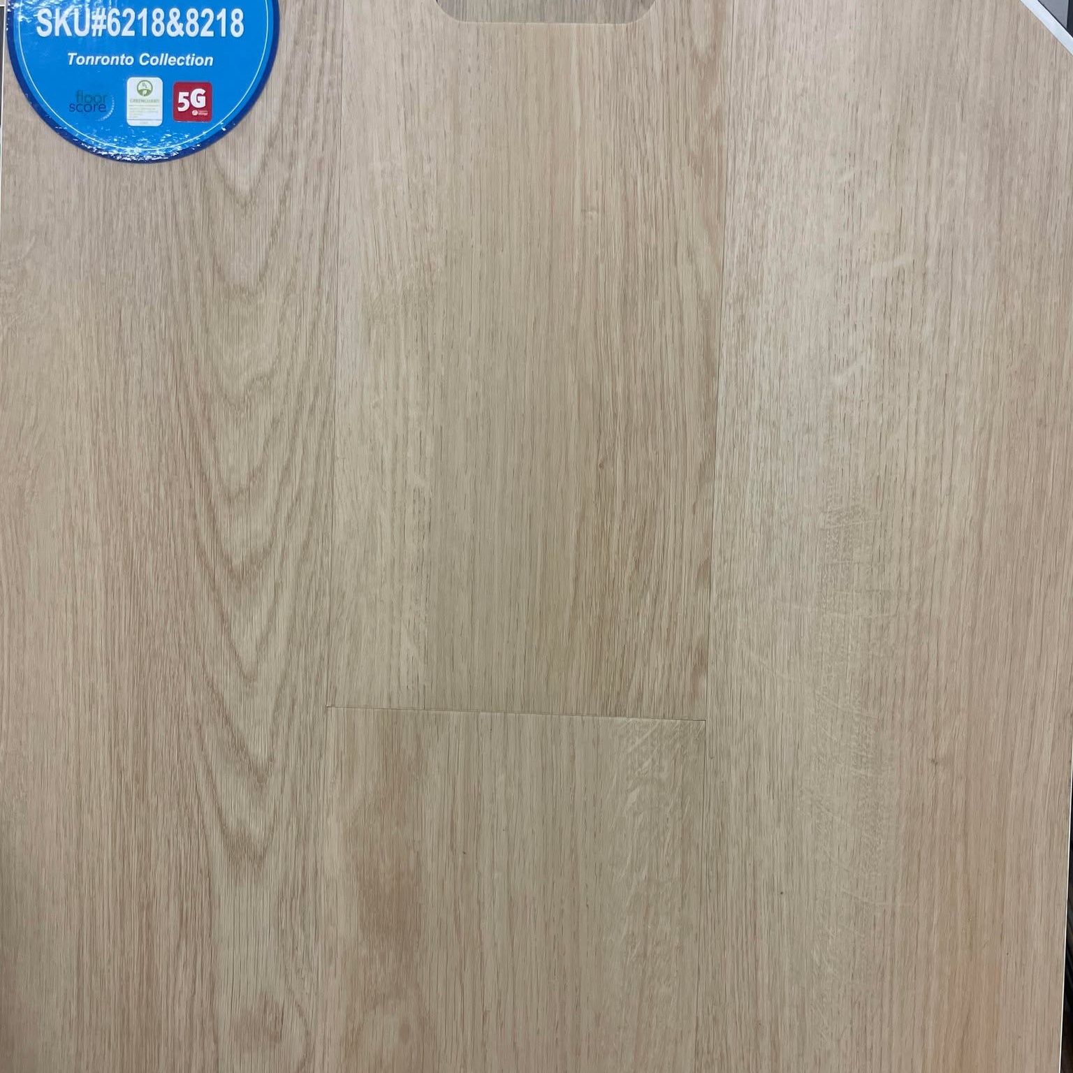 Close-up showing the texture and color of the Toronto collection- Riche 8mm & 10mm vinyl flooring.