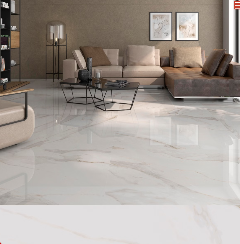 A living room with modern decor featuring beige and brown furniture on a glossy, light-colored tile floor.