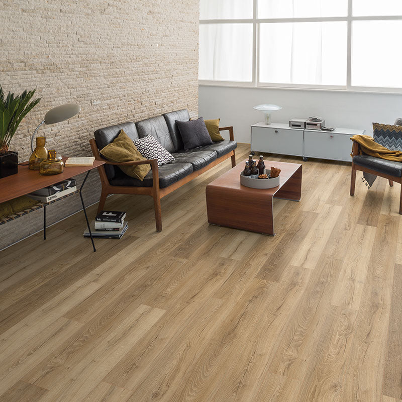 Modern living room with wooden flooring, furniture, and decor.