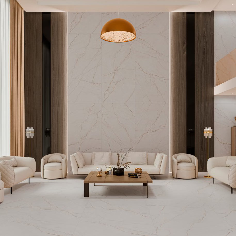 Modern living room with marble walls, beige furniture, and a coffee table.