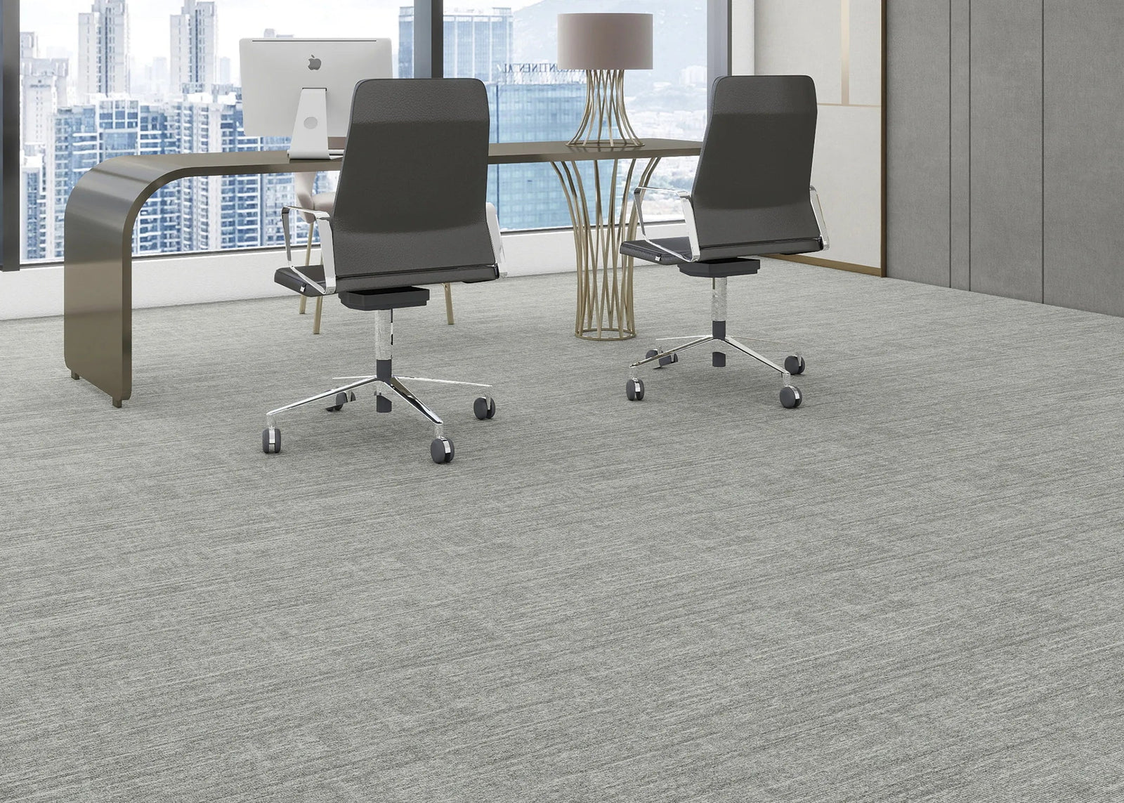 Modern office interior with a desk and chairs on a textured gray carpet.