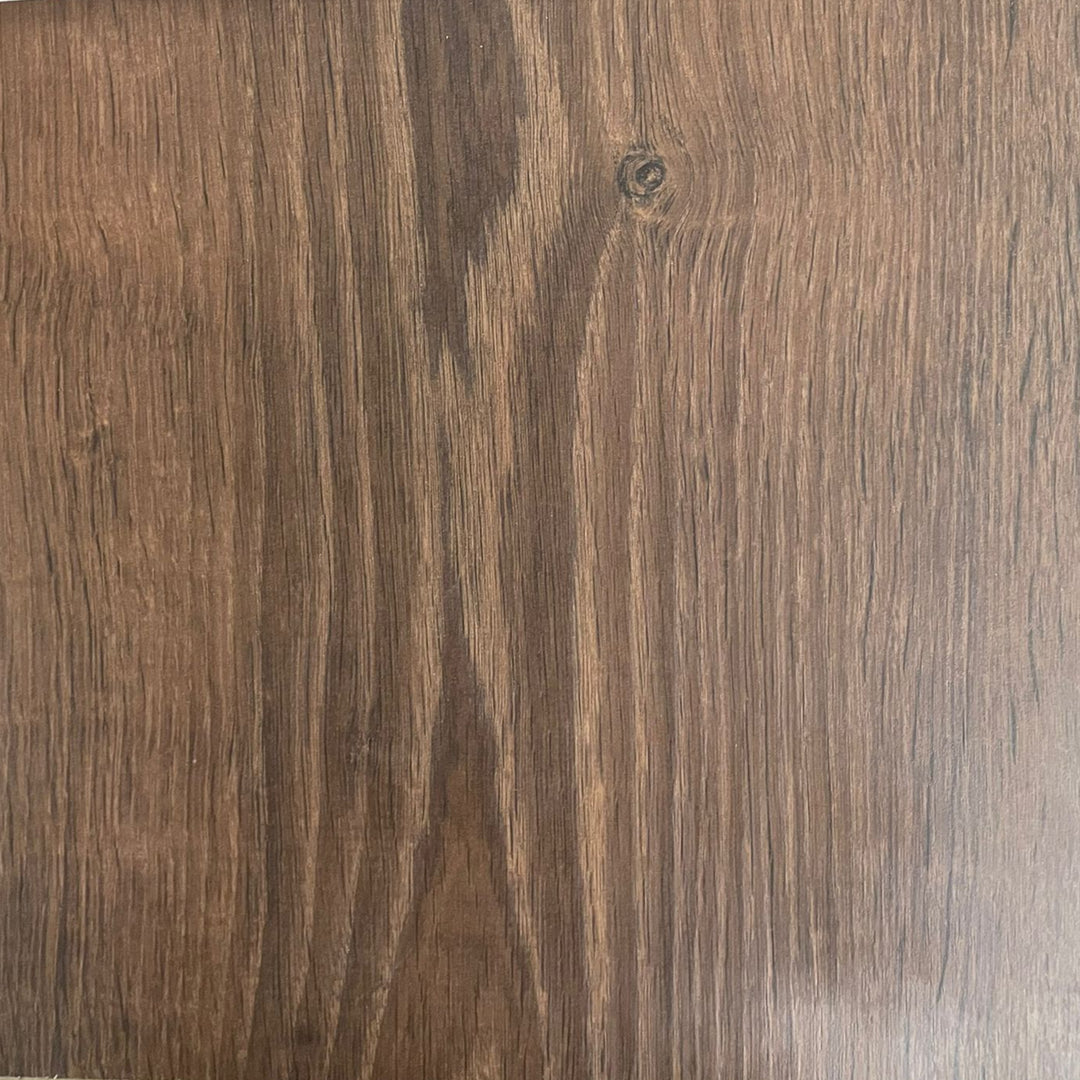 Close-up image of a wood flooring surface with a brown color and visible wood grain patterns.