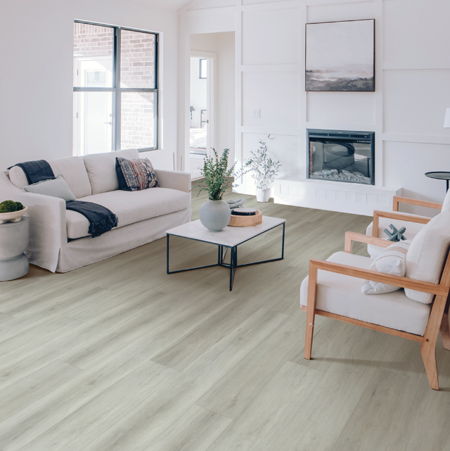 Modern living room with Beaulieu SPC vinyl flooring in Andamas 2316 color. Canada-wide delivery available. 