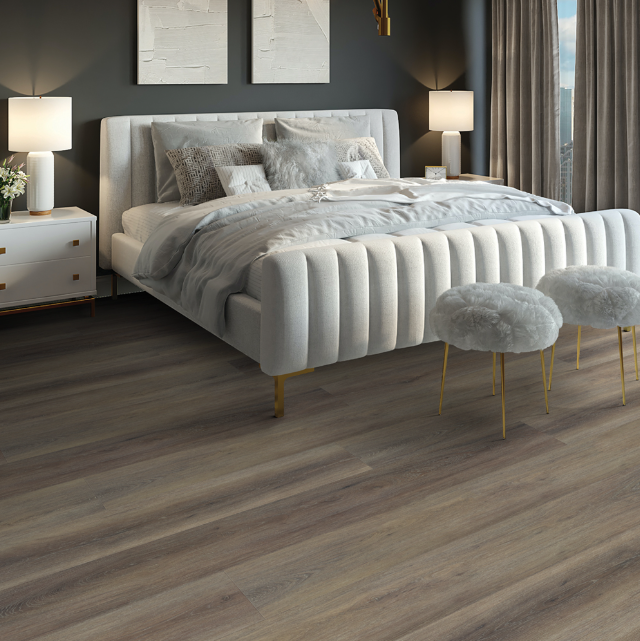 Modern bedroom with Beaulieu SPC vinyl flooring in Seychelles 2321  color. Installation services in Waterloo & Kitchener, and Canada-wide delivery available.