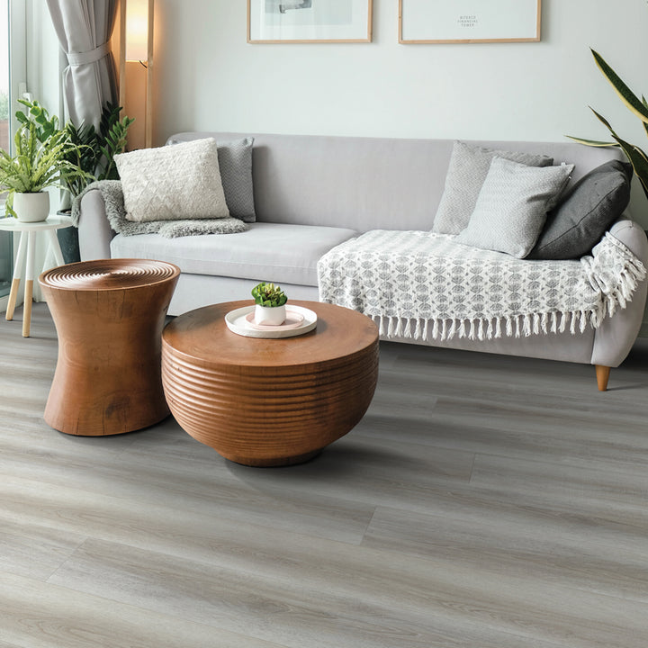 Living room view with Acorn 6048 Beaulieu 8.5mm WPC vinyl flooring. Available at Advanced Flooring Waterloo. 