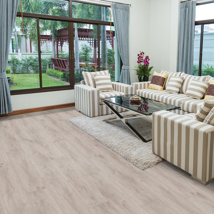 Modern living room with Macadamia 6036 Beaulieu 8.5mm WPC vinyl flooring. Available at Advanced Flooring Waterloo. 