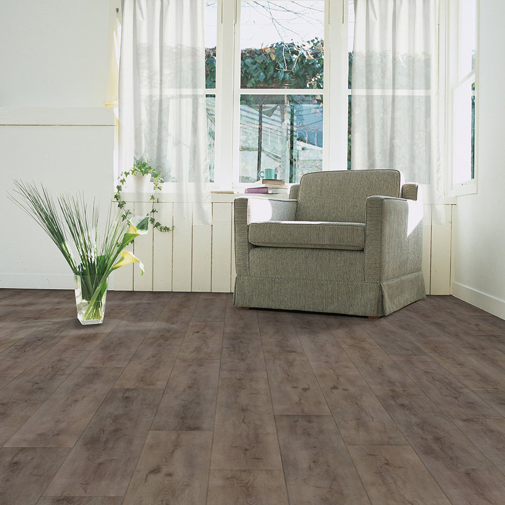 Close-up room view with Pecan 6038 Beaulieu 8.5mm WPC vinyl flooring. Available at Advanced Flooring Waterloo. 