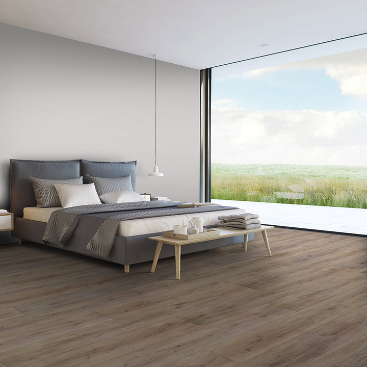 Modern bedroom with Beaulieu 8.5mm WPC vinyl flooring in Pecan 6038 color. Installation services in Waterloo & Kitchener, and Canada-wide delivery available.