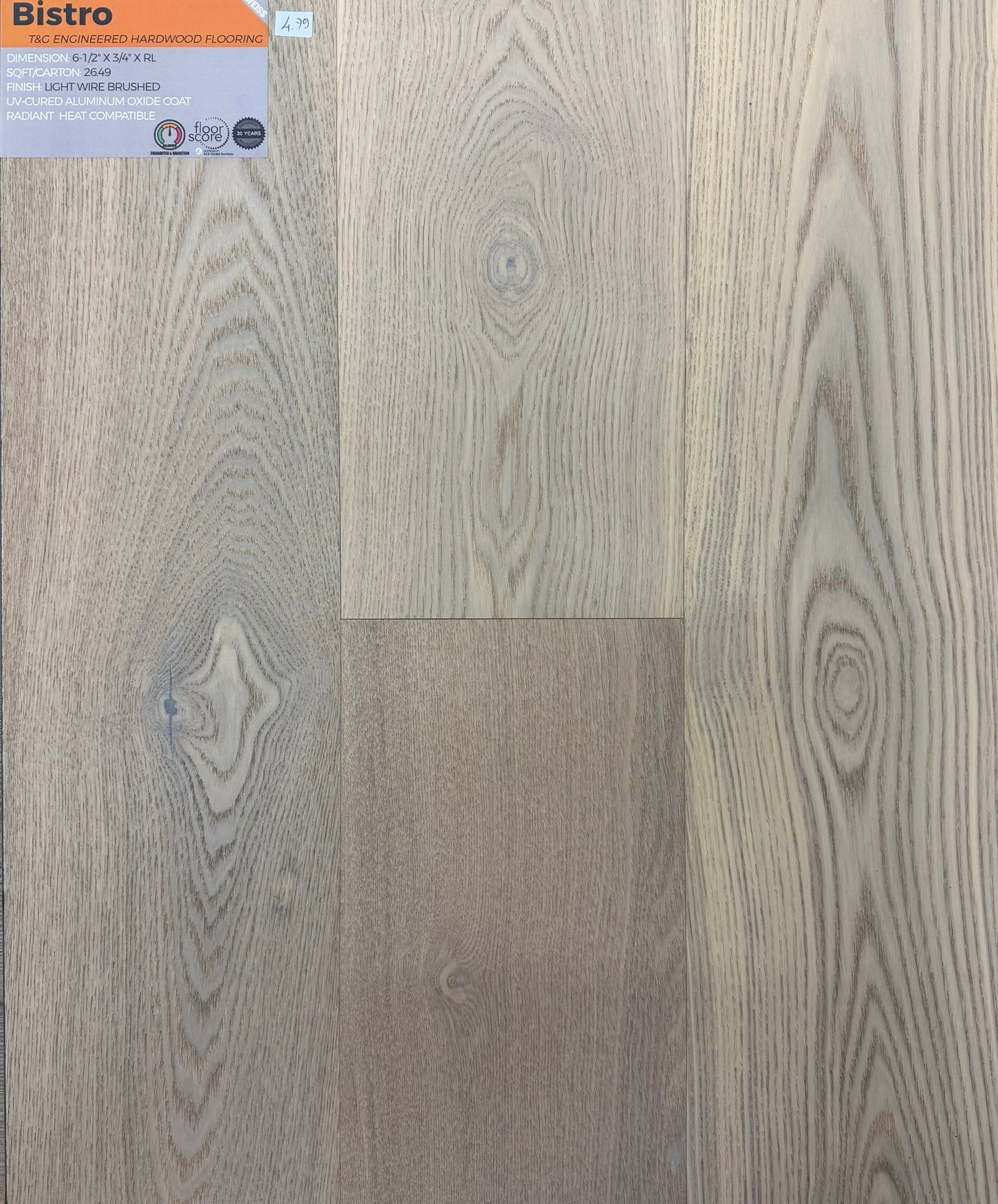 Wooden flooring sample with 'Bistro' label on a gray background