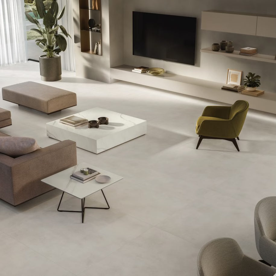 Modern living room with minimal furniture and decor.