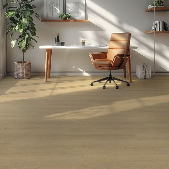 Modern office space with a desk, chair, and plants on a wooden floor.