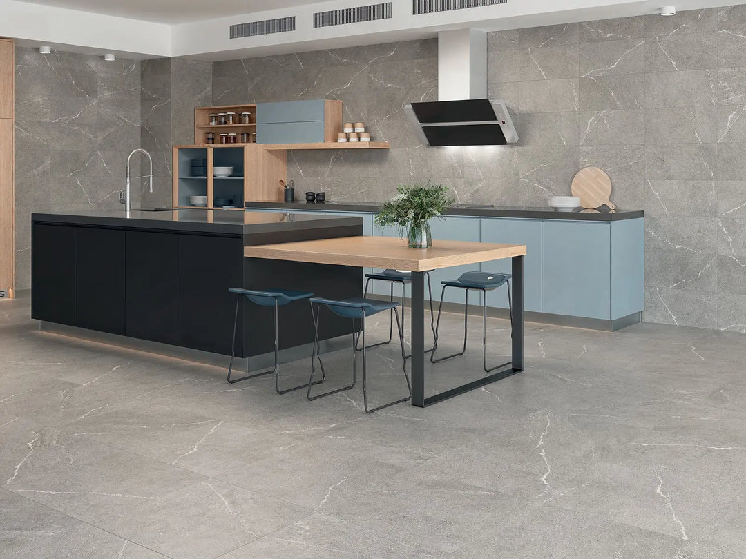 Modern kitchen with gray marble tiles on walls and floor