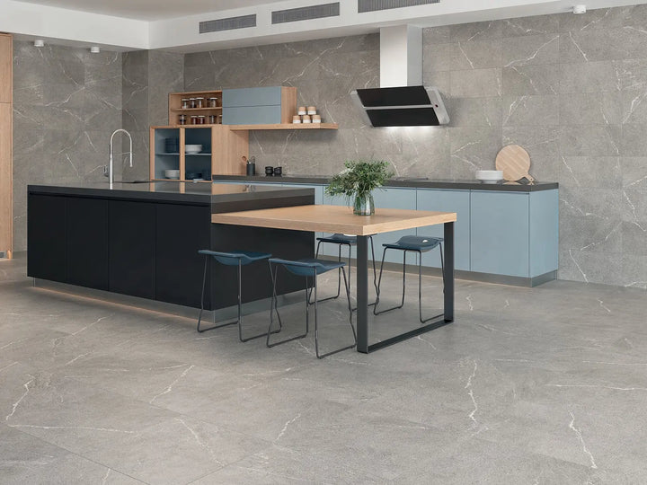 Modern kitchen with gray marble tiles on walls and floor