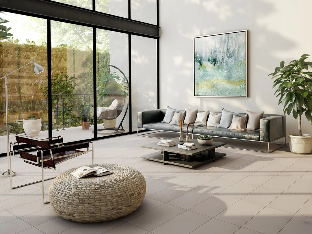 Modern living room with a sofa, coffee table, and decorative elements.