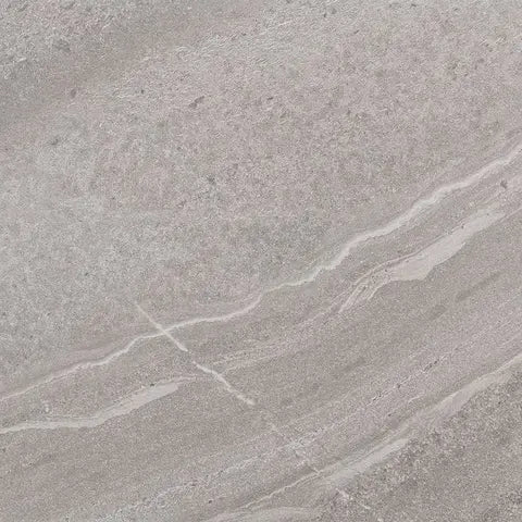 Close-up of a gray stone surface with subtle variations in color.