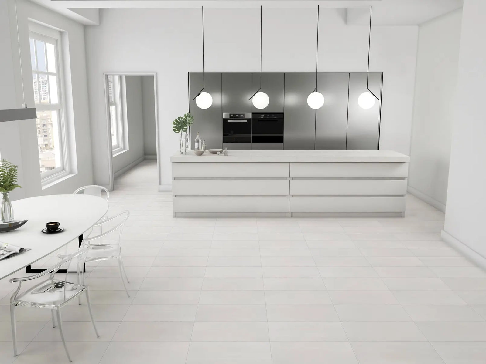 Modern kitchen with white cabinets, stainless steel appliances, and a dining area.