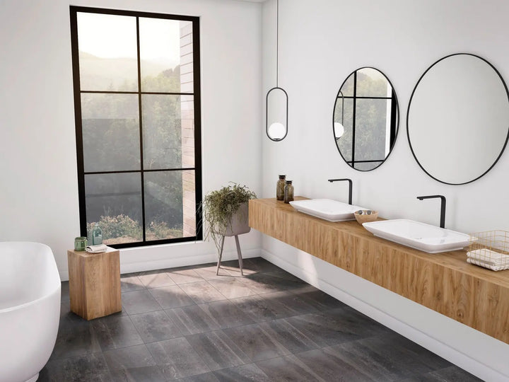 Modern bathroom with wooden vanity, two sinks, and large windows.