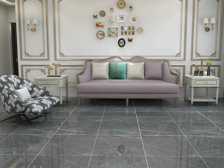 Living room with a lavender sofa, armchair, and decorative elements.