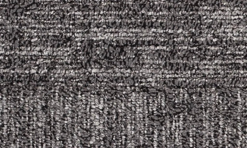 Close-up of textured gray carpet