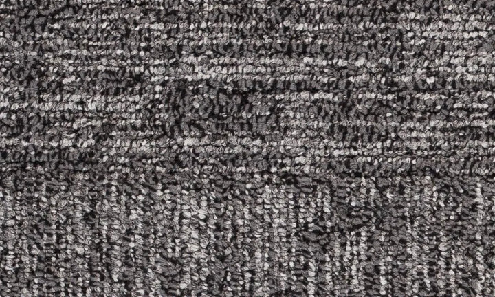 Close-up of textured gray carpet
