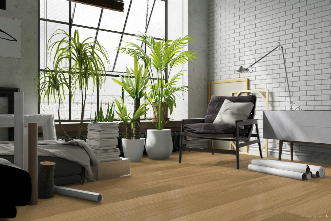 Modern living room with plants, furniture, and a white brick wall.