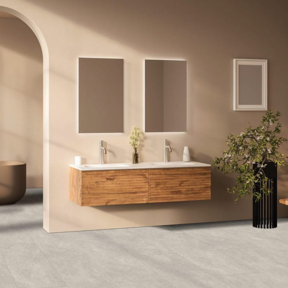 Bathroom with wooden vanity, mirrors, and decorative elements.