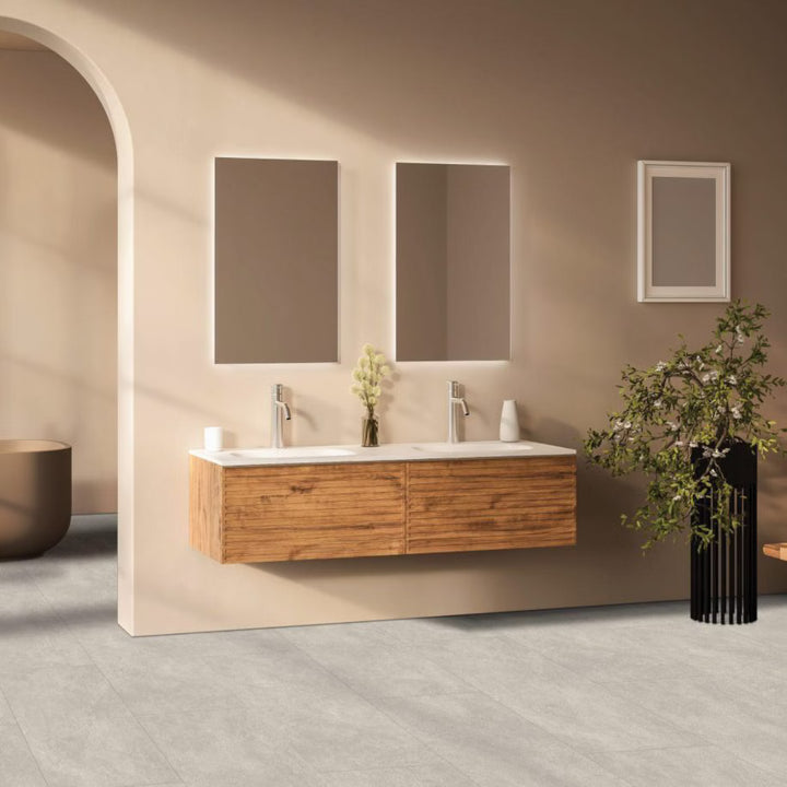 Bathroom with wooden vanity, mirrors, and decorative elements.