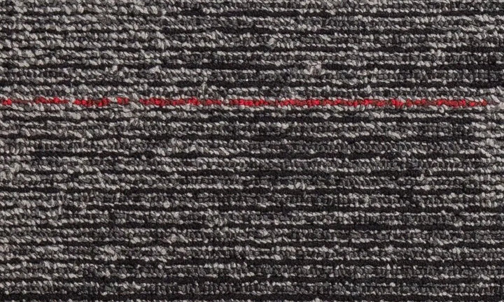 Close-up of textured gray fabric with red text overlay
