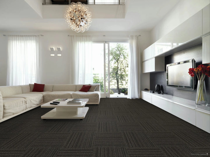 Modern living room with a sectional sofa, coffee table, and television.