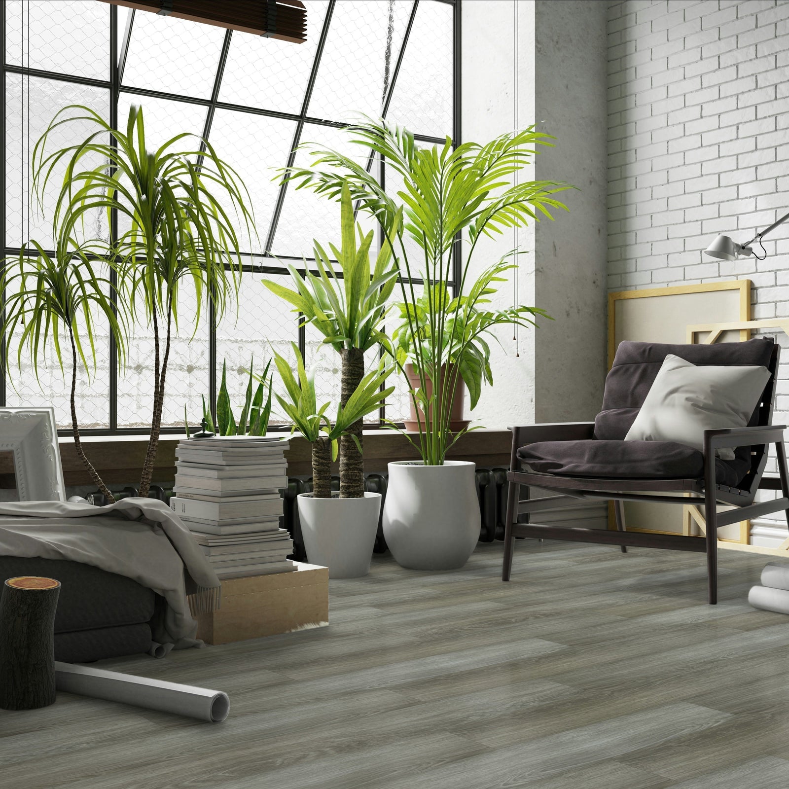 Modern living room with gray sofa, plants, and white brick wall