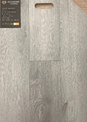 Gray wood-patterned flooring with a sample and product information label.