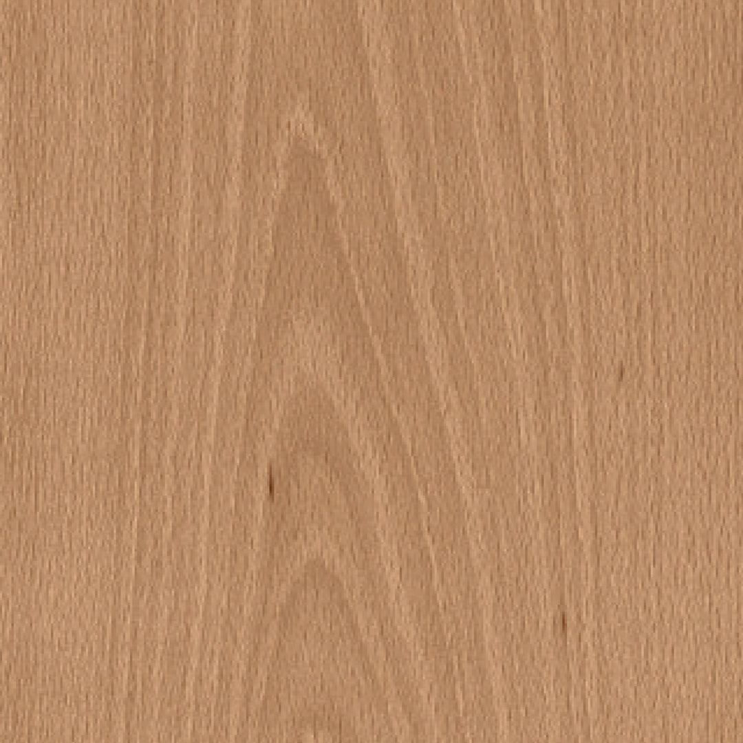 Close-up of a wooden surface with a light brown color and visible grain pattern.