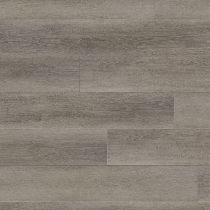 Close-up of a wooden floor with a grayish-brown color and visible grain pattern.