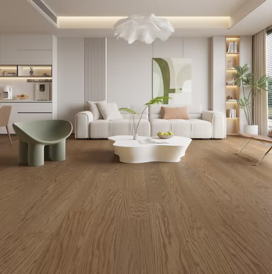 Modern living room with wooden flooring, white furniture, and decorative elements.
