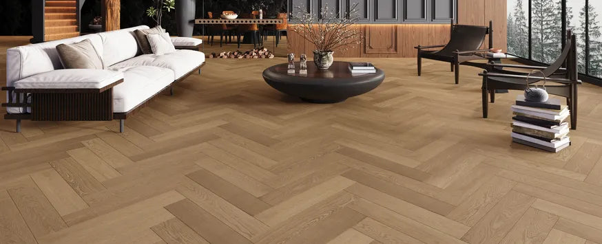 Room view of Ember Cloak engineered hardwood from Fuzion's Velvet Grove Herringbone collection. Available at Advanced Flooring Waterloo.